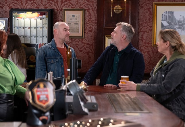 Steve and Tim laugh together in the Rovers in Coronation Street
