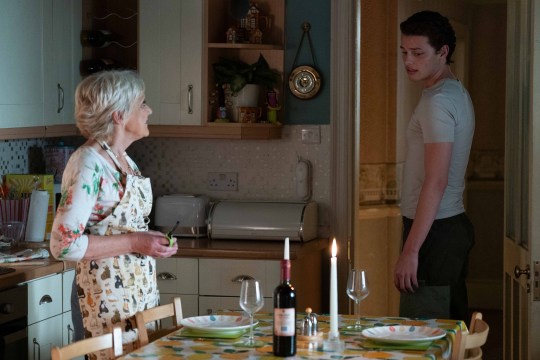 Freddie talks to Jean, who is preparing a romantic meal, in EastEnders