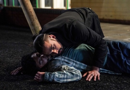 Ravi checks on Nugget after he's found unconscious in EastEnders