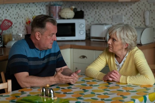 Harvey and Jean have a chat at the kitchen table in EastEnders